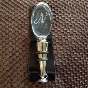 Clear intial N wine stopper